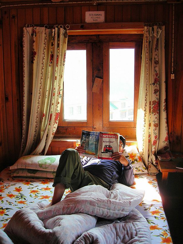 me-in-hillarys-room3 Me reading in Ed Hillarys room in Junbesi a village on the Everest trek