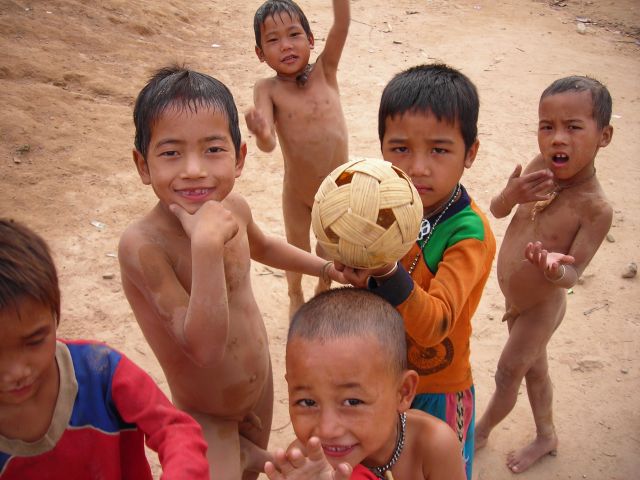 kids playing soccer with bamboball