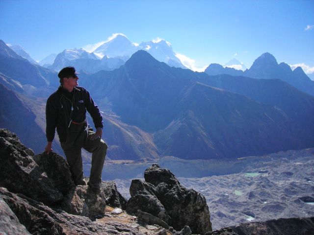 at the summit on Gokyo Ri, in the back the Mt. Everest