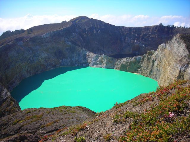 the famous crater lake of Kelimutu on the island of Flores in Eastern Indonesia